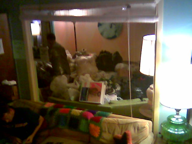 blurry image of a large number of items behind the mirror