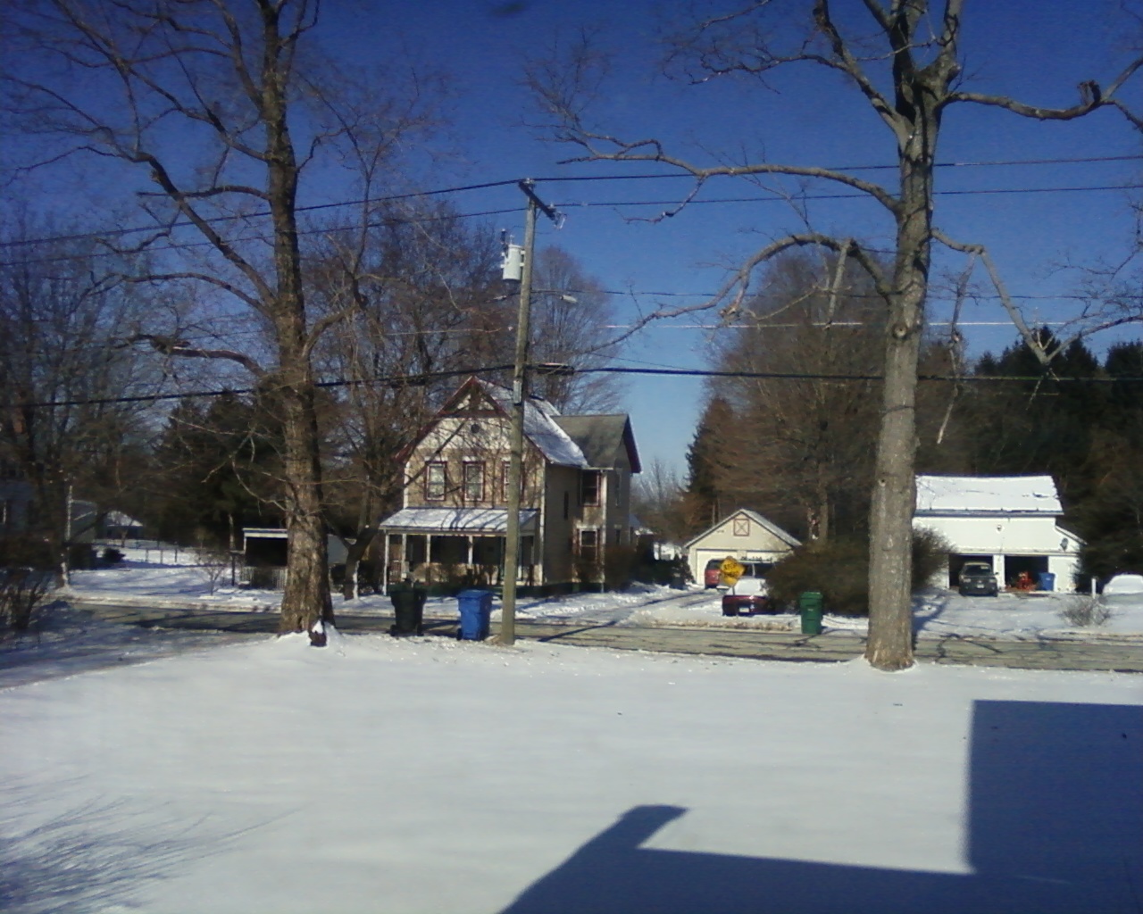 there are two people standing in the snow