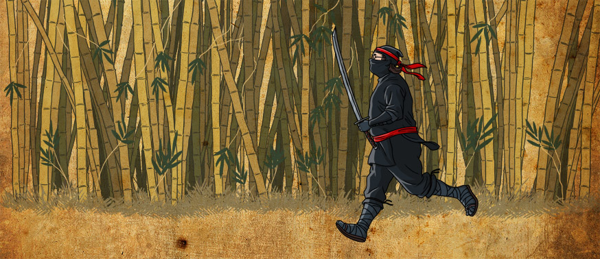 the man is wearing black and running through bamboo stalks