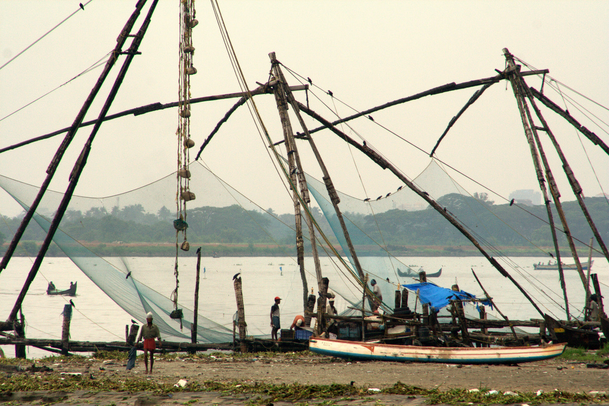 several fishing nets are pulled into the ocean