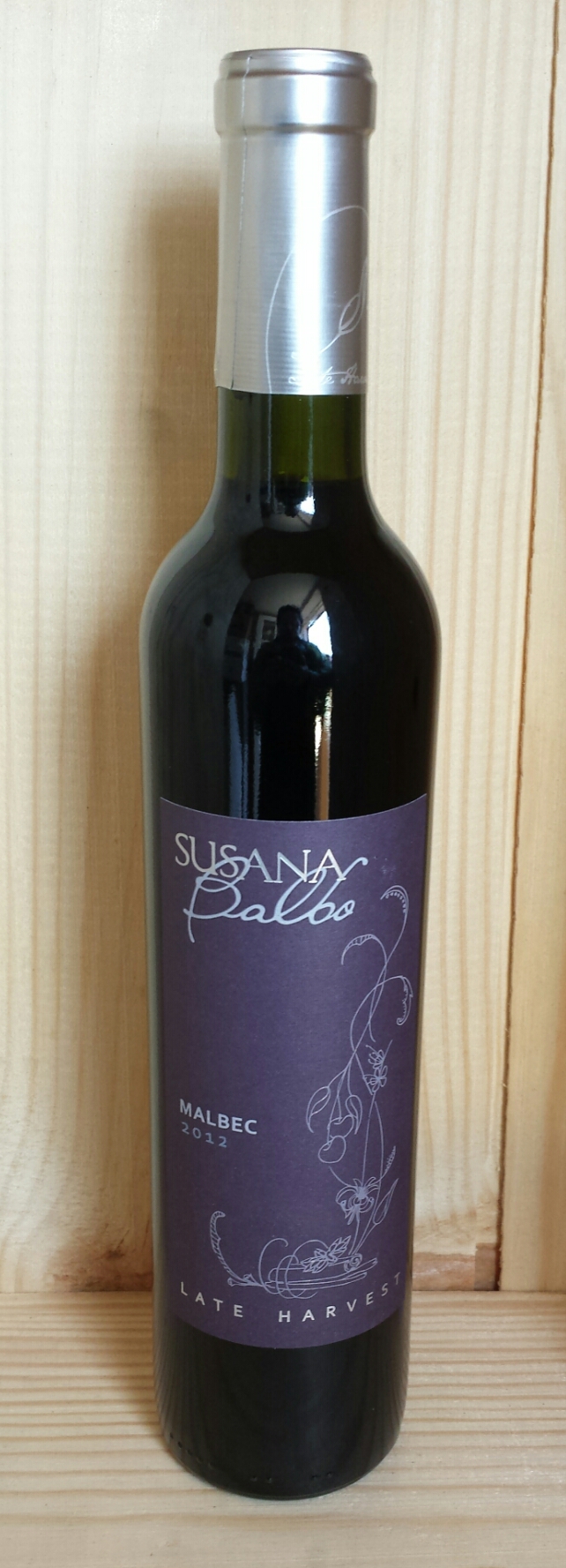 a bottle of wine with an image on the label
