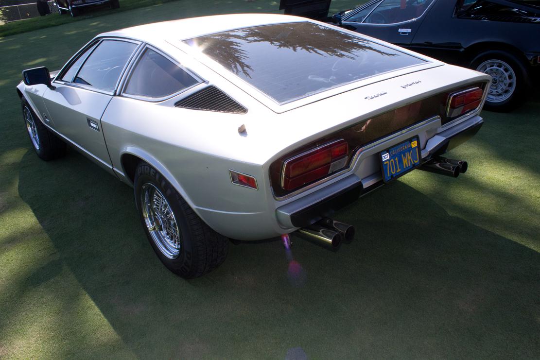 white toyota sports car parked on the lawn