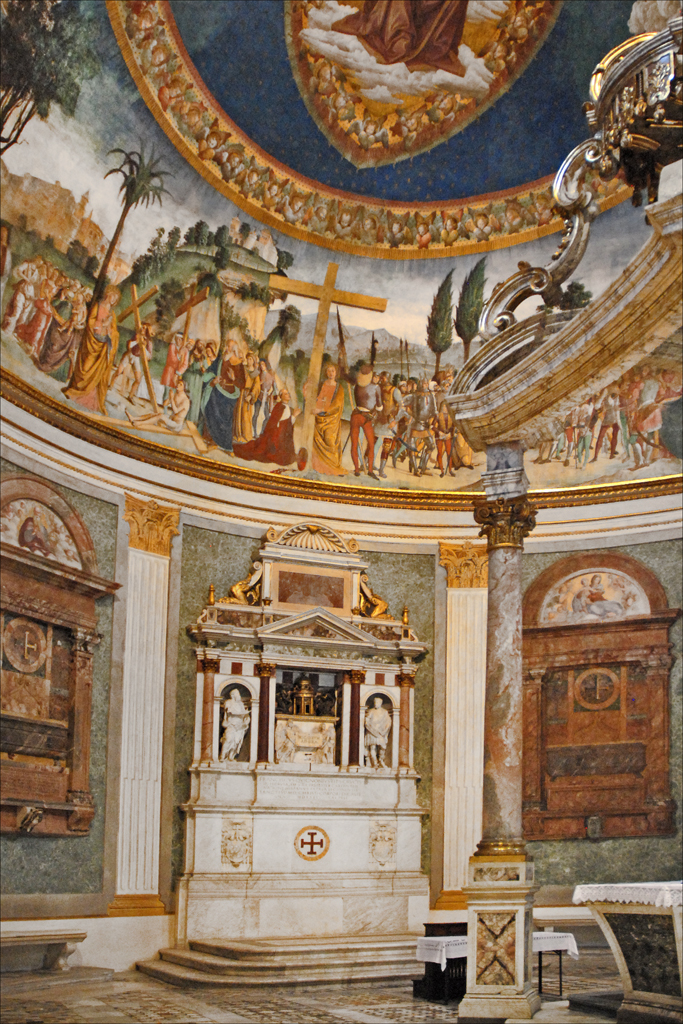 an elaborately painted room with a painted dome in the background