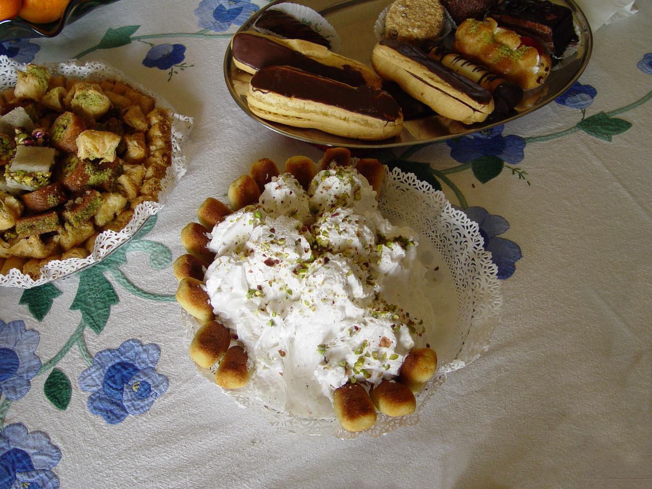 a bunch of desert food sitting on a table