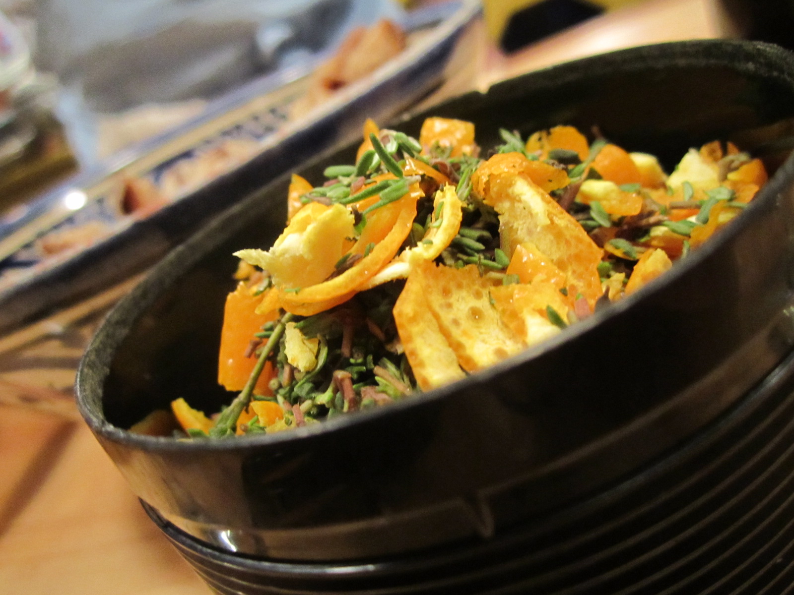 a bunch of toasted vegetables sitting inside a bowl