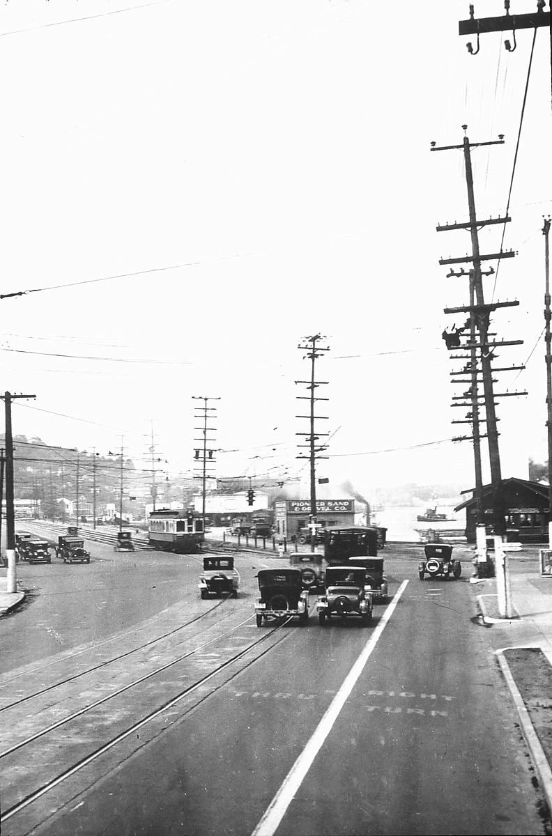 an old po of traffic on a busy street