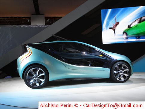 an electric car with a man on the screen