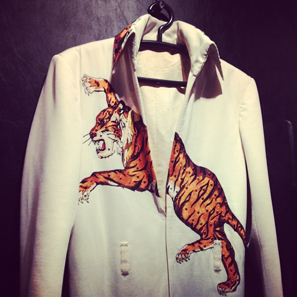 a jacket decorated with an image of a tiger