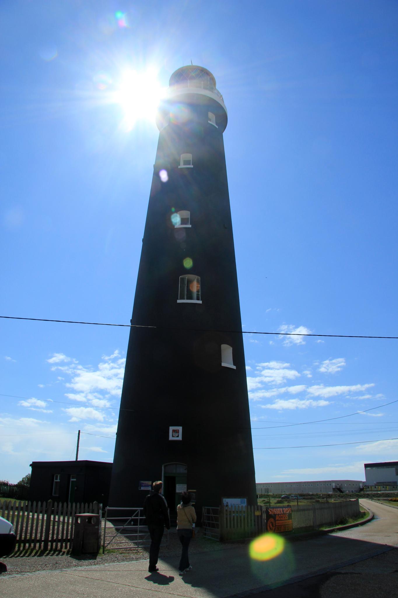 the lighthouse is situated on the sunny day