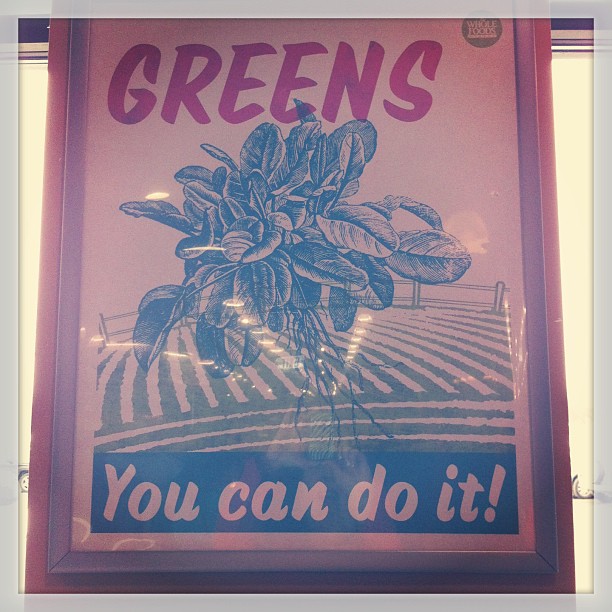 an advertit on a wall for green's tea