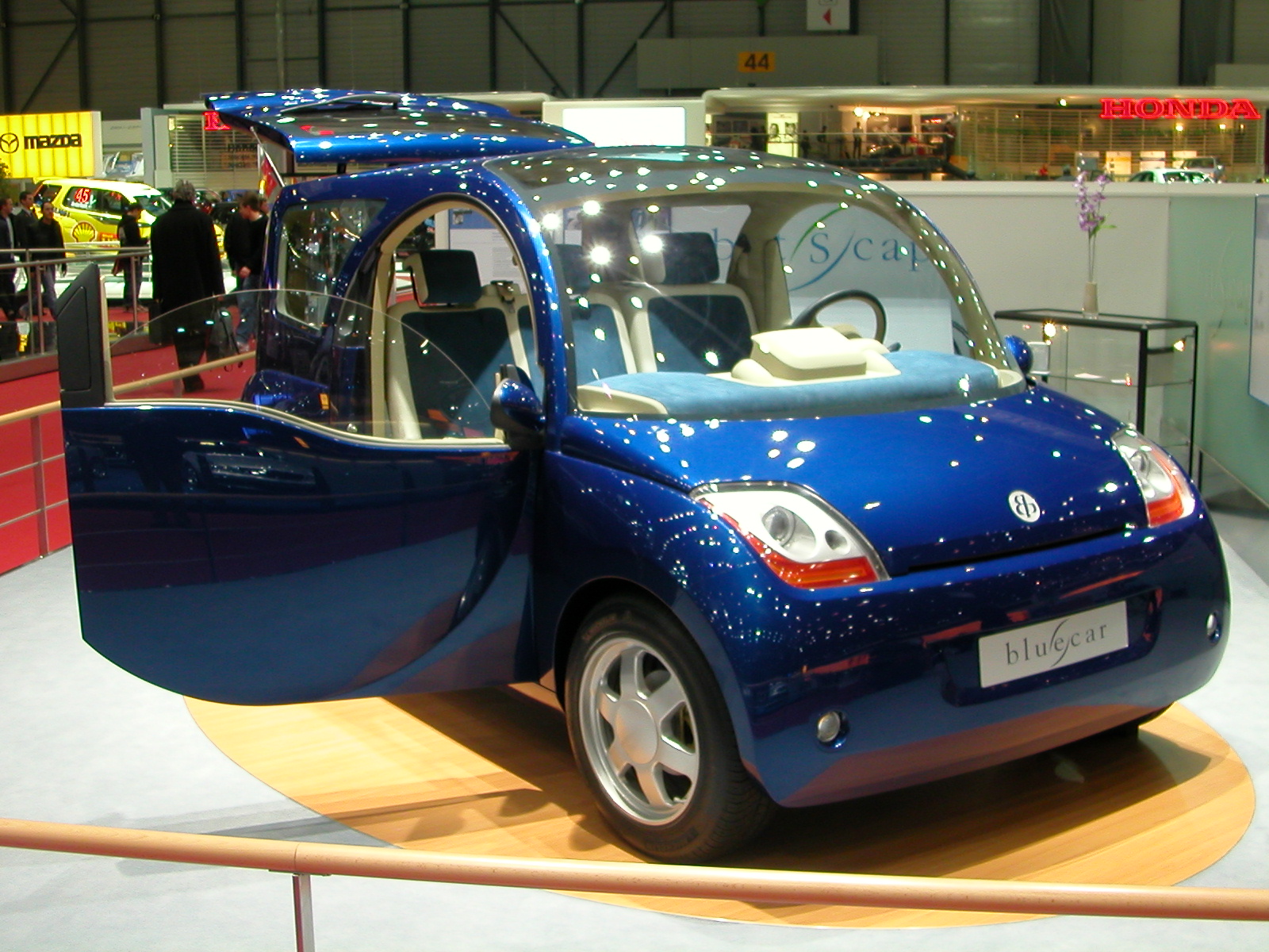 the new blue concept car is displayed in an exhibit