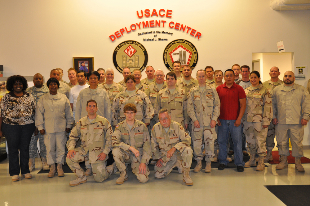 a group of soldiers posing in front of the department