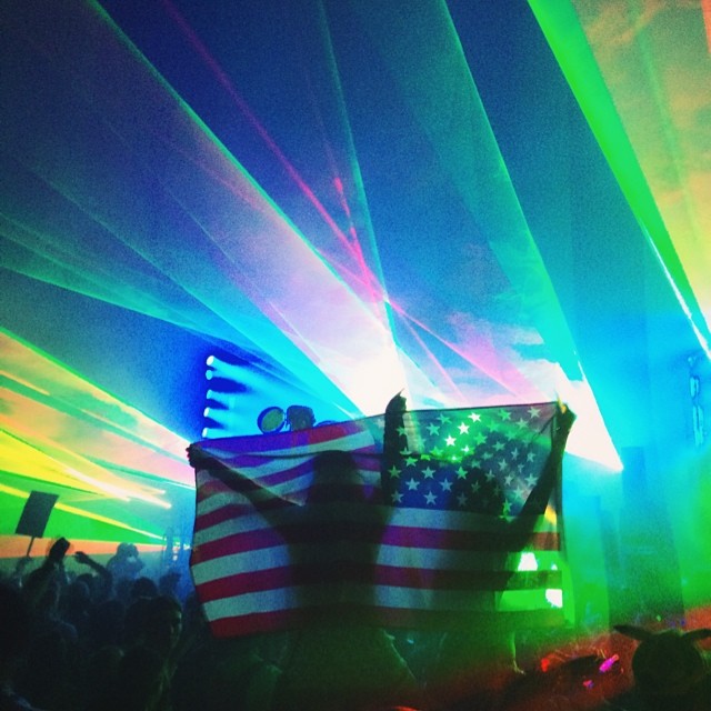 a flag is flown at a concert with the american flag
