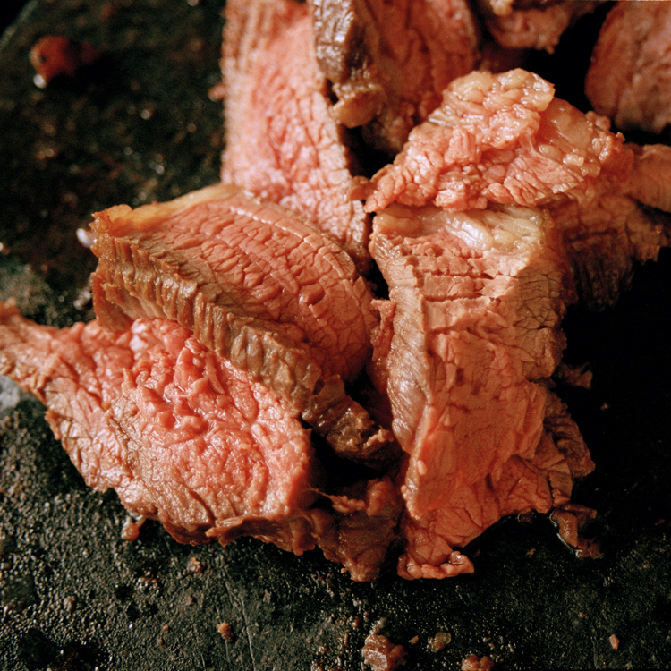 closeup of an uncut beef on a table