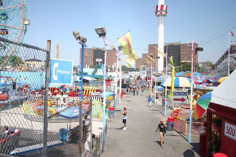 carnival attraction with lots of people running around