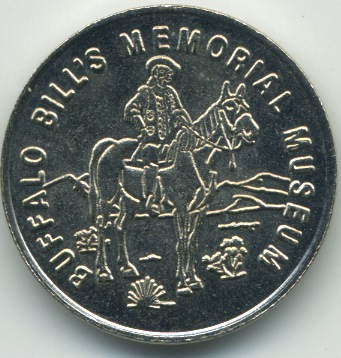 a small coin with a man on a horse
