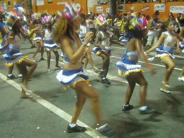 a group of cheerleaders wearing skirts and shoes
