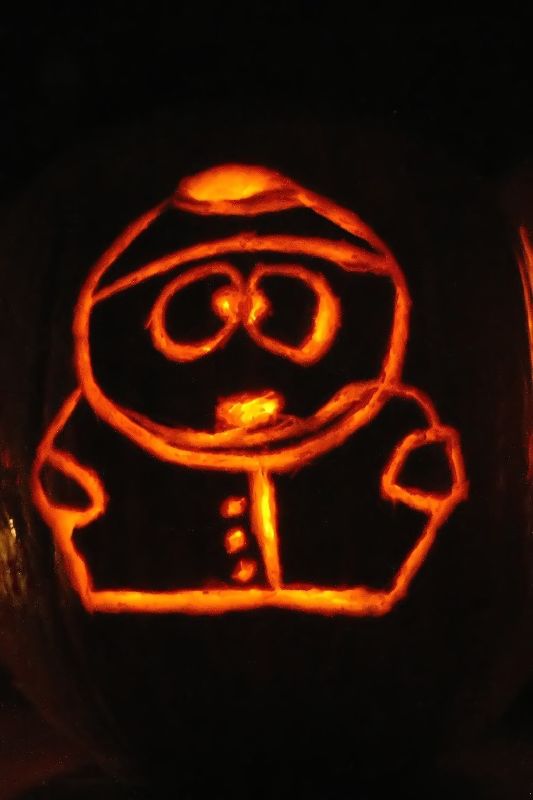 a carved pumpkin with the image of peppa pig in it