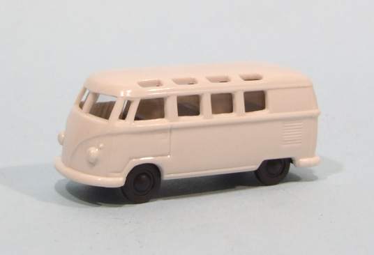 an old model bus, white and red