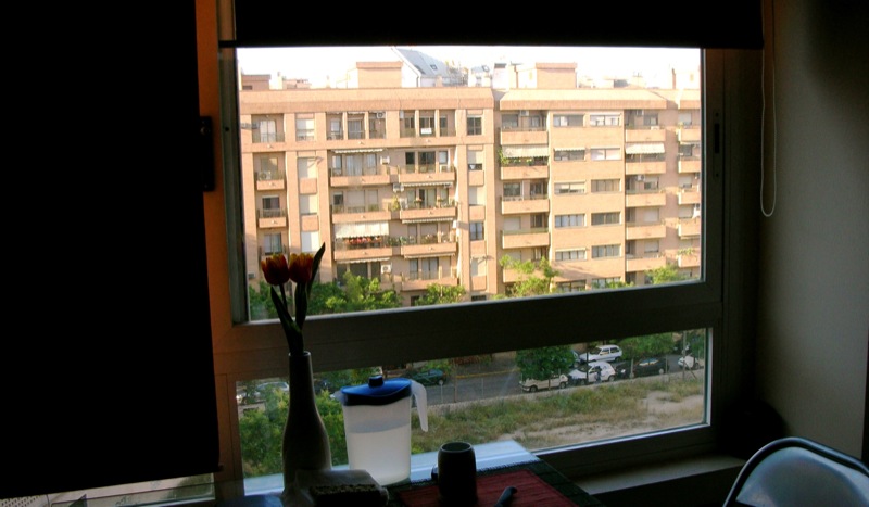 a room with a view of the city outside
