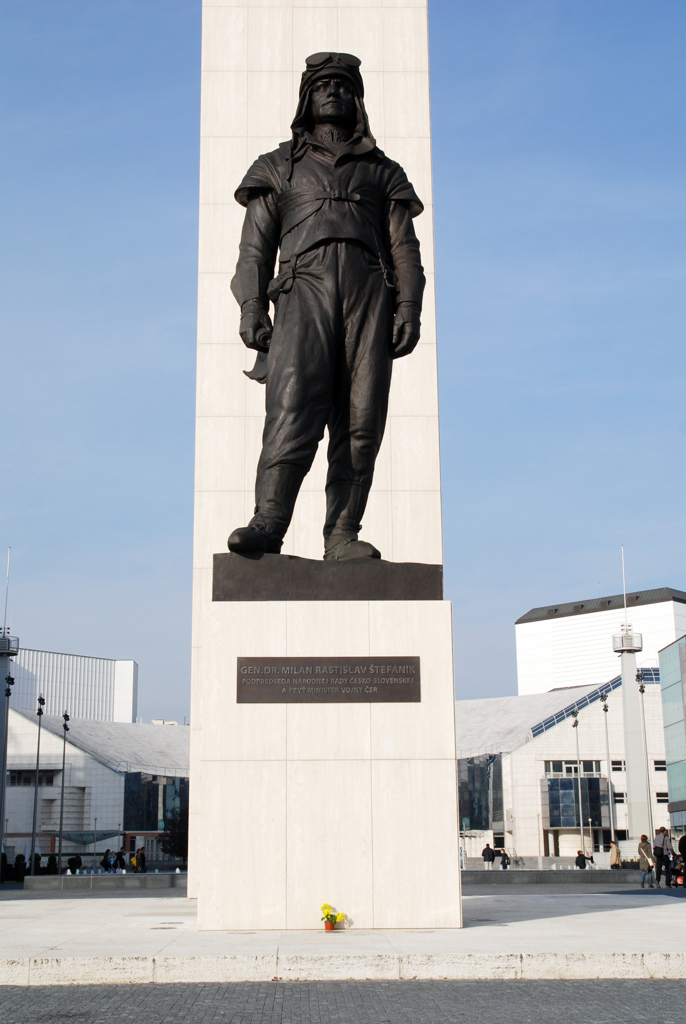 a large statue of a man in an overall