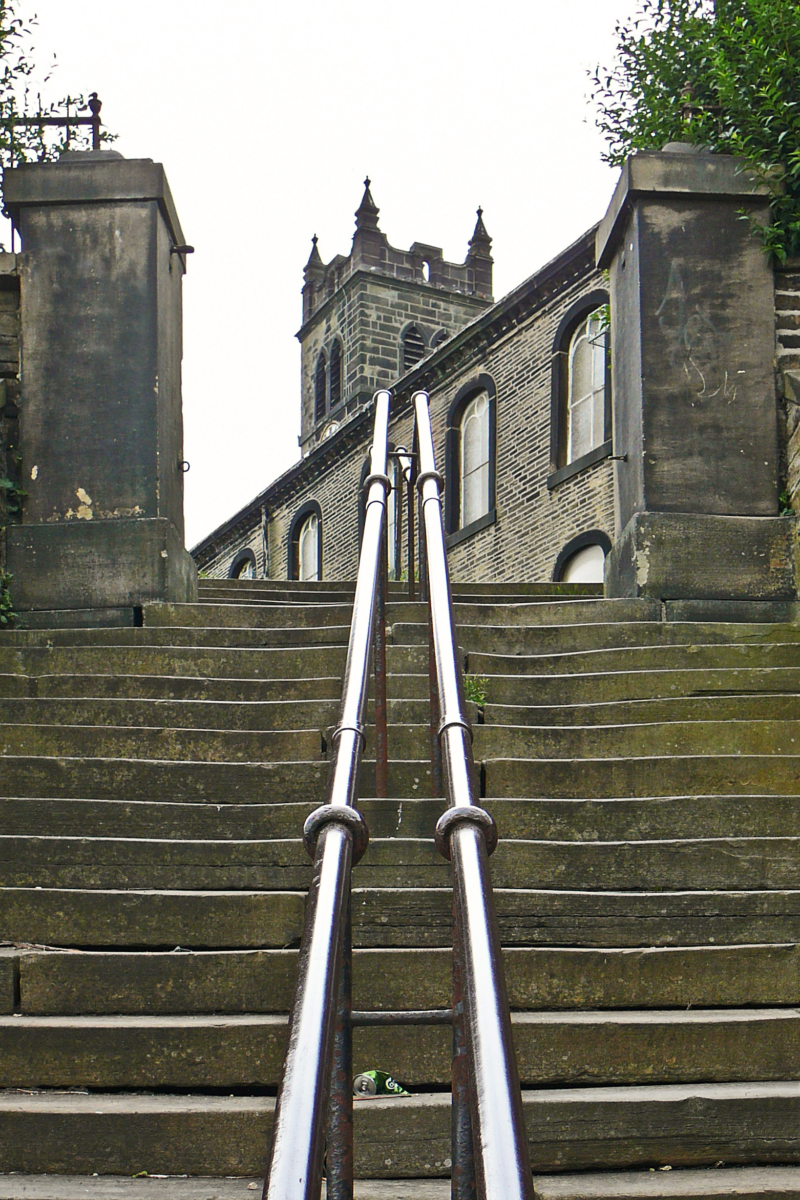 an iron set of stairs leading up to a castle