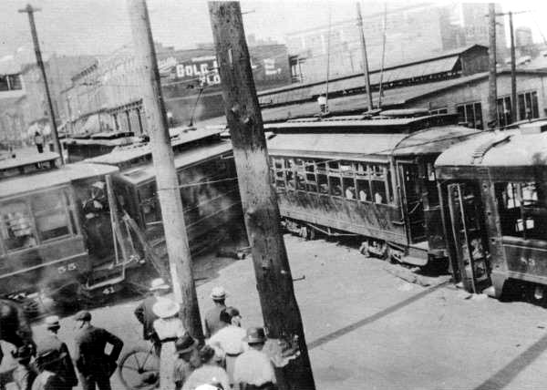 a vintage train station full of passengers