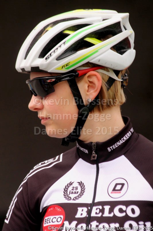 a women who is wearing a bicycle helmet and sunglasses