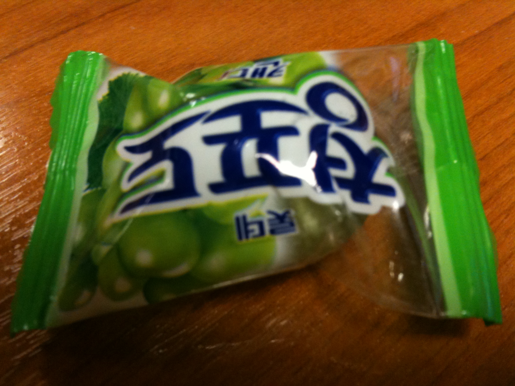 two snack bag sitting on top of a wooden table