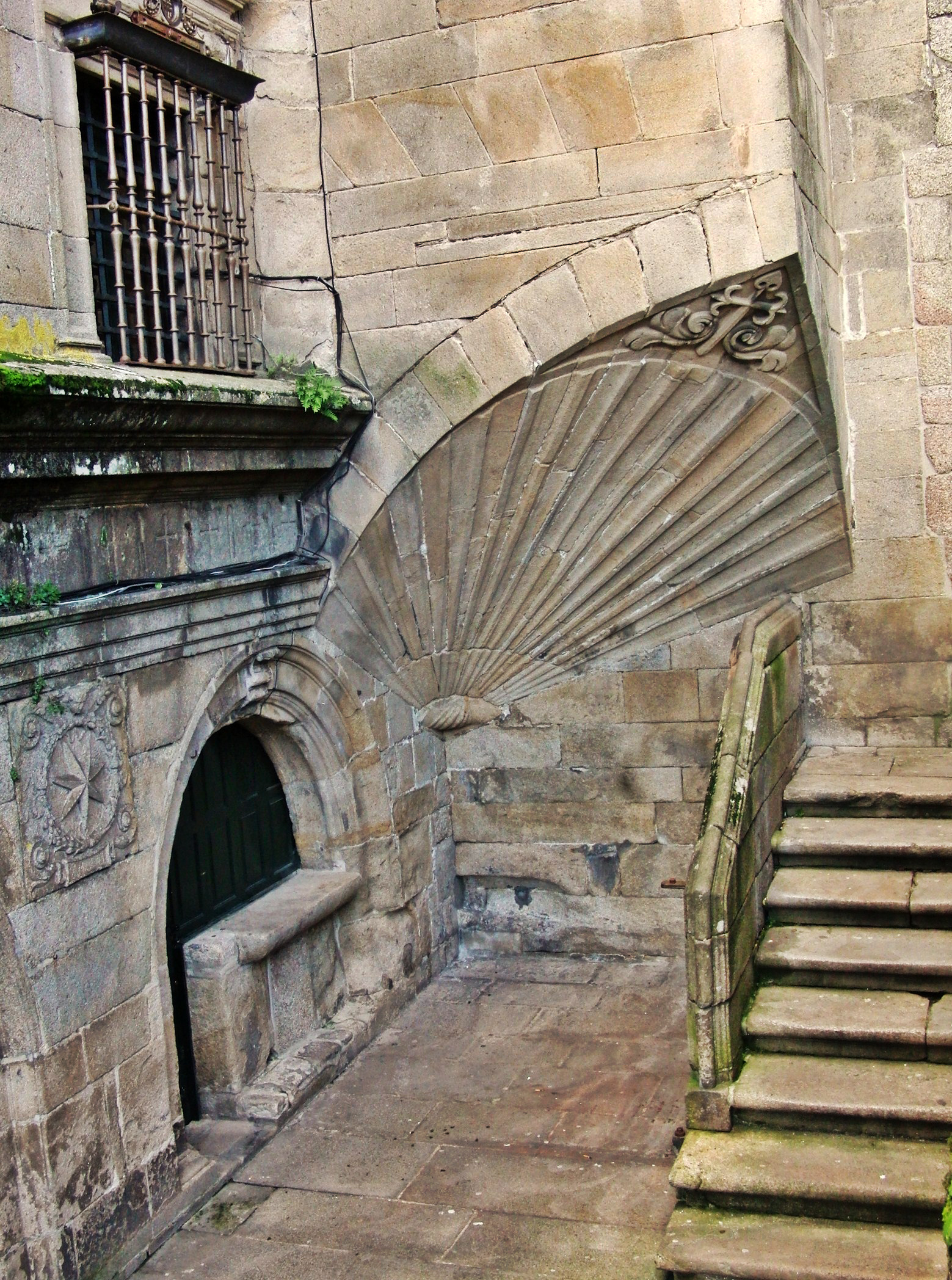 a doorway and steps inside a building in an old town