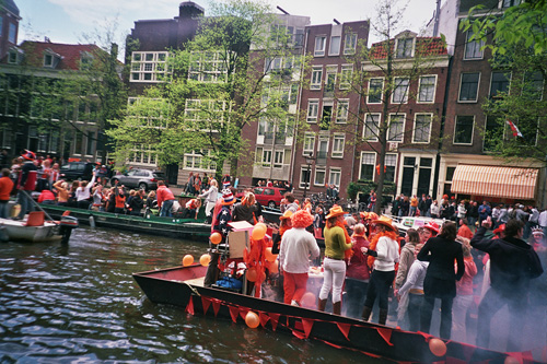 a boat on a river with many people