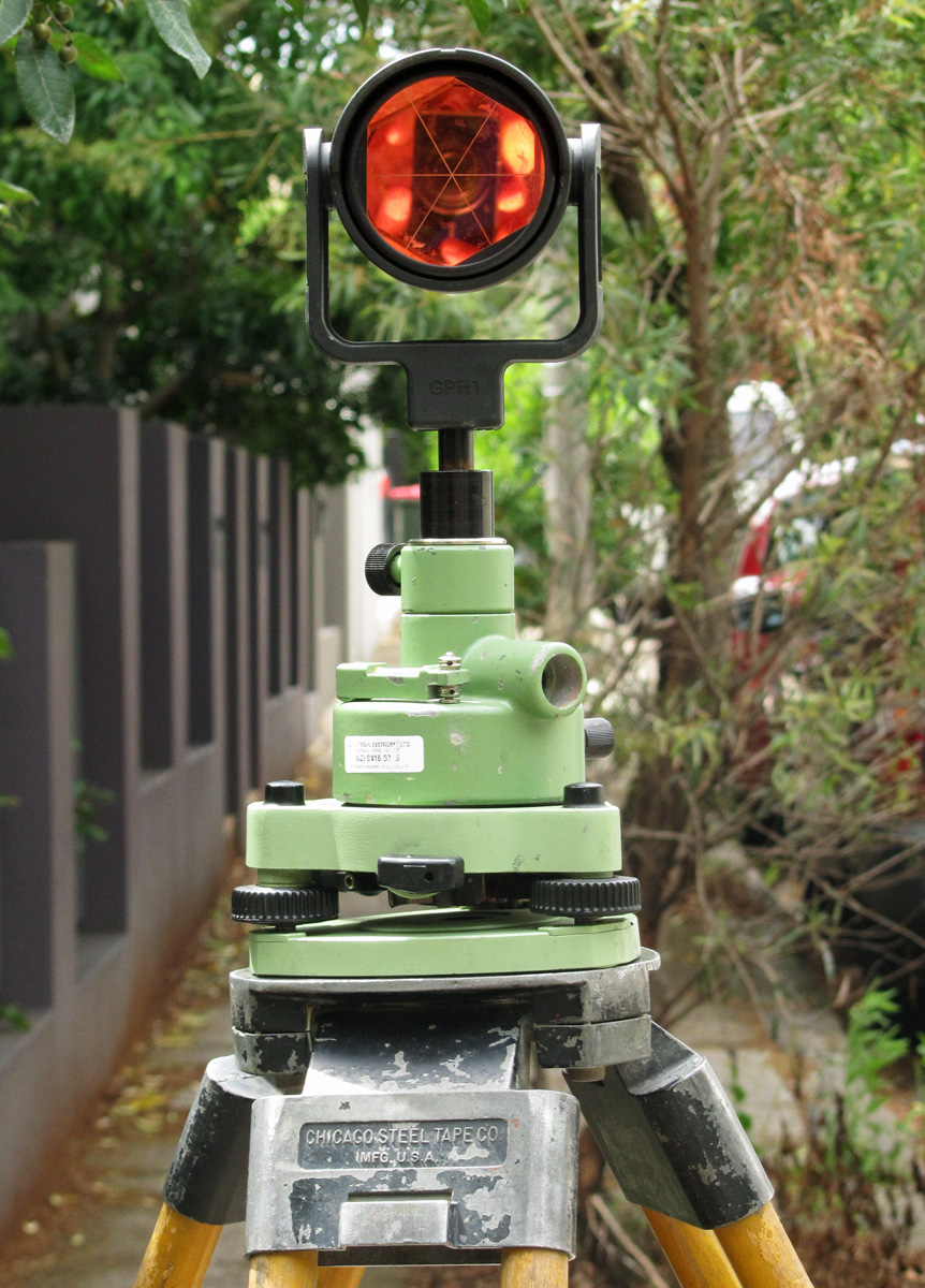 a stoplight is placed on top of some poles