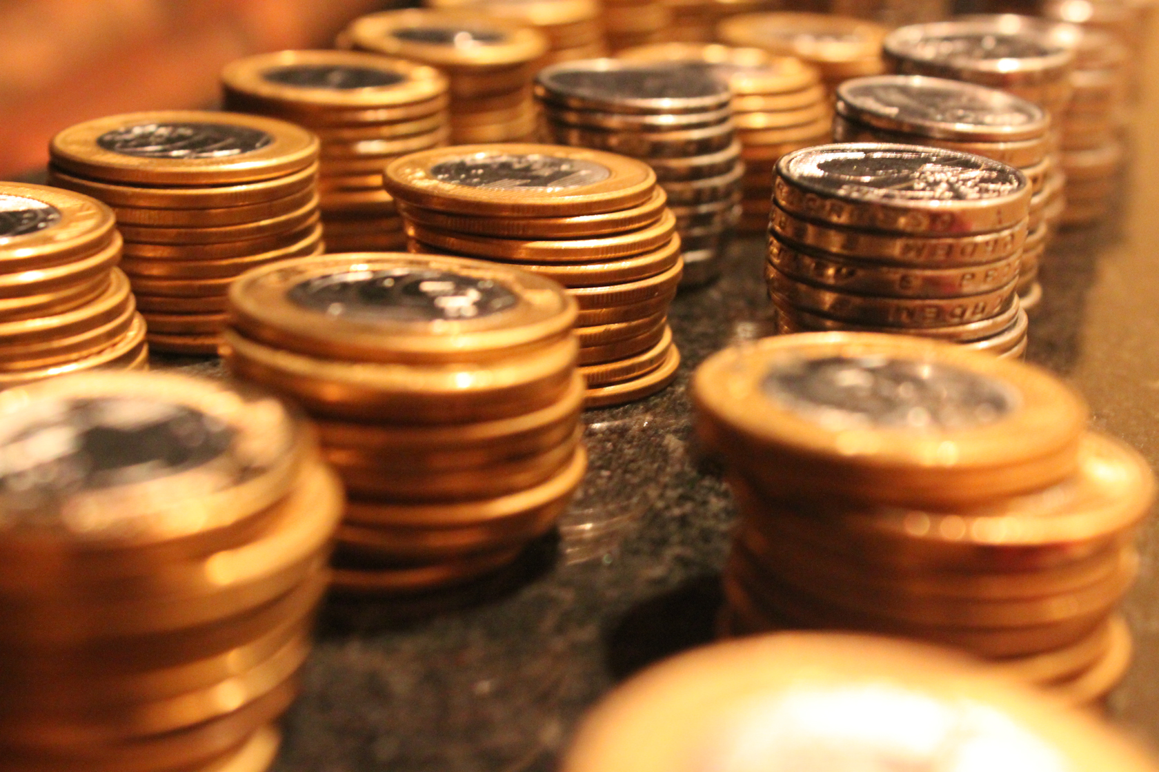 a close up of piles of penn dollars