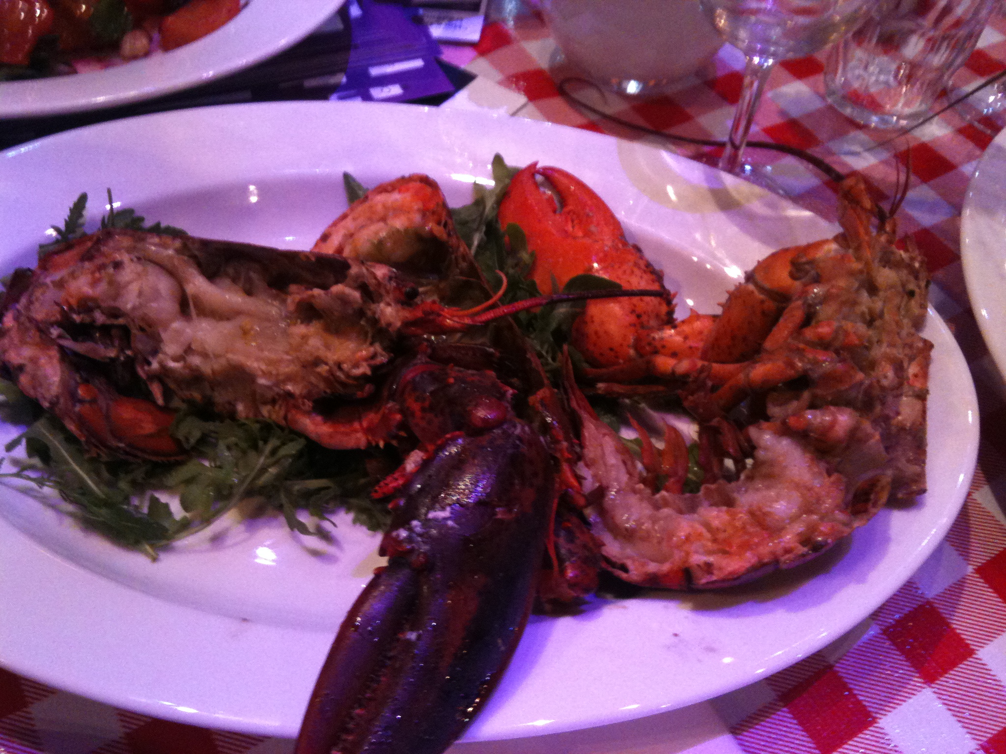 two plates on a table with food on it