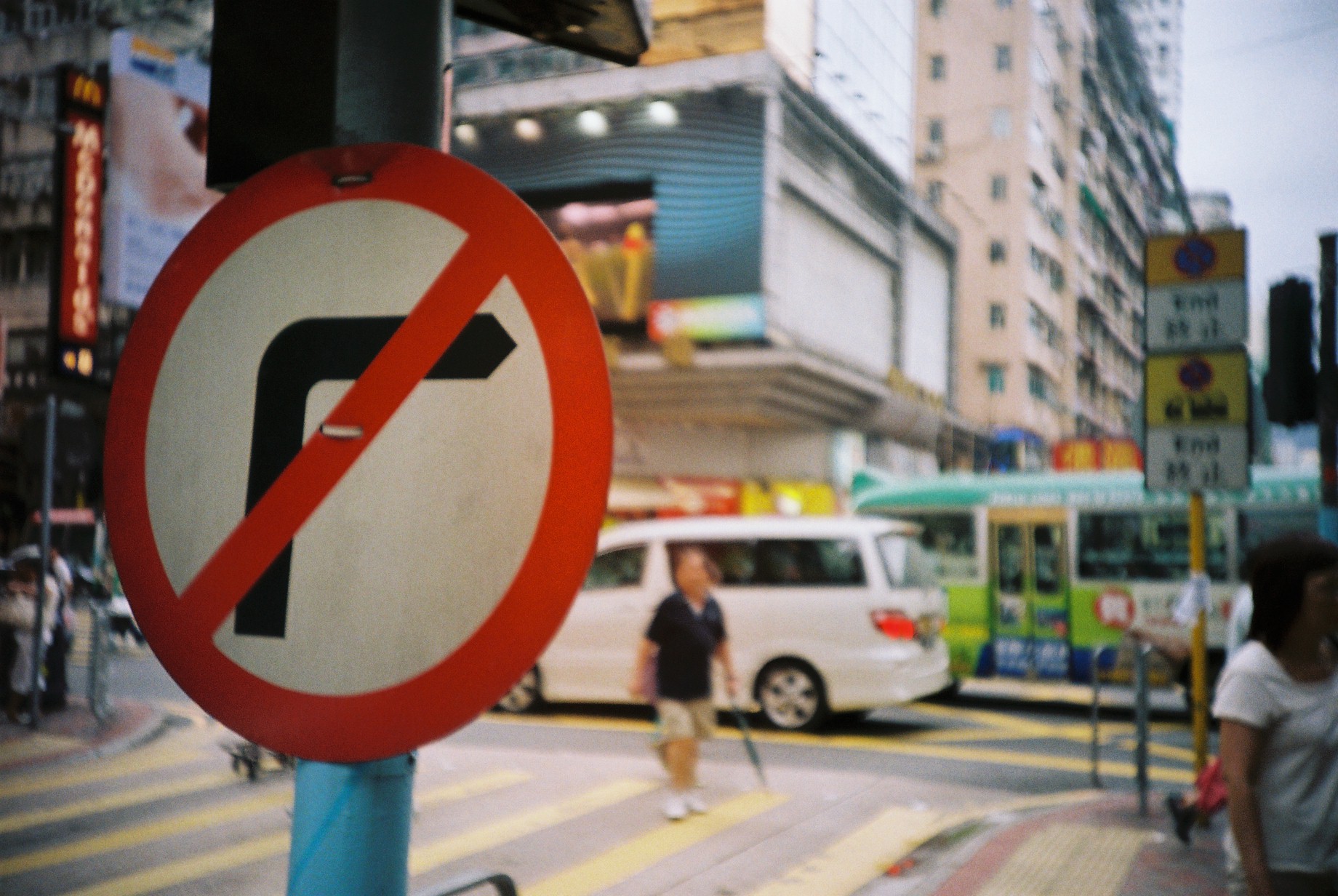 a road traffic sign sitting on the side of a road