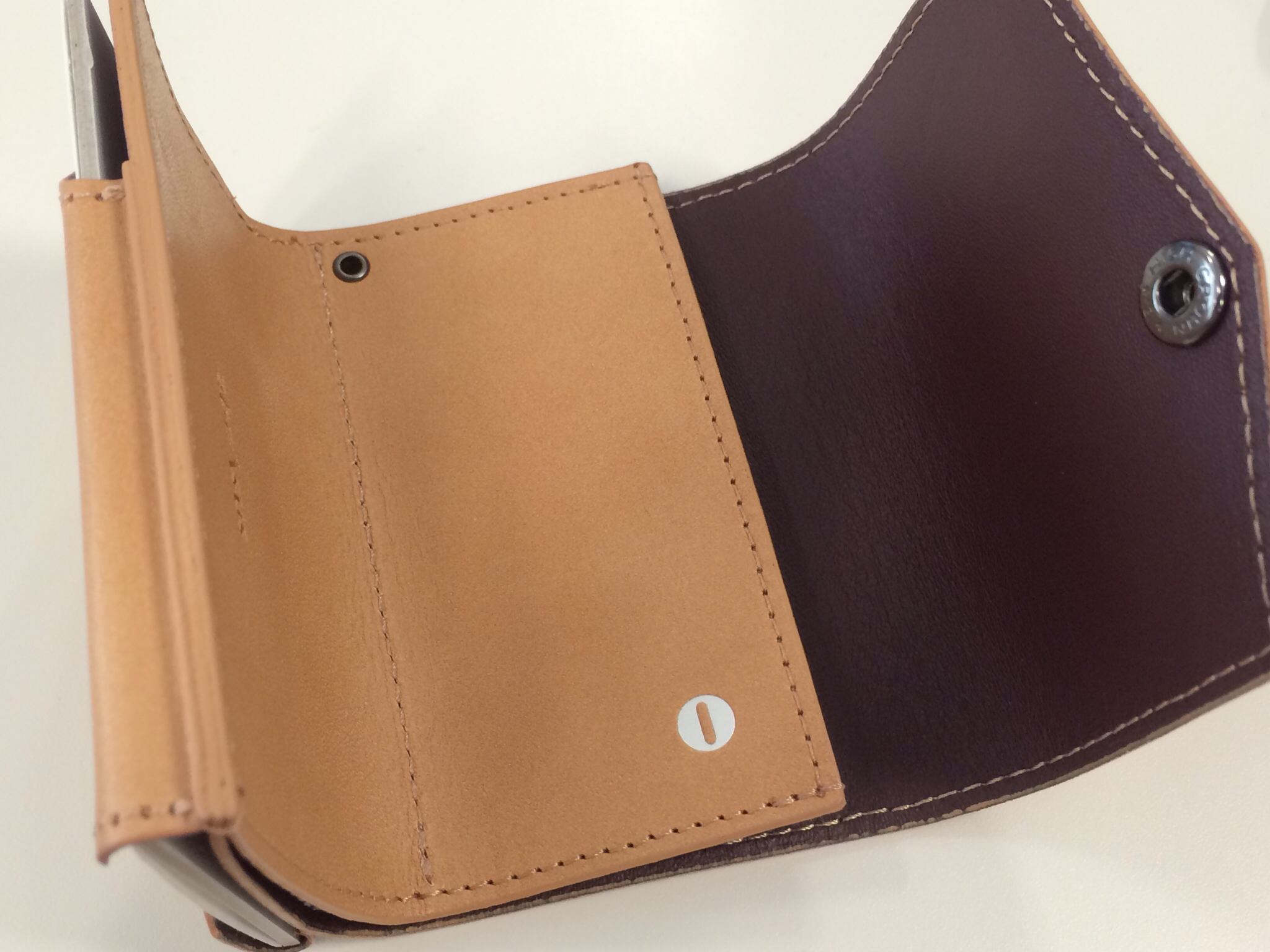 two colors of leather sit in the wallet