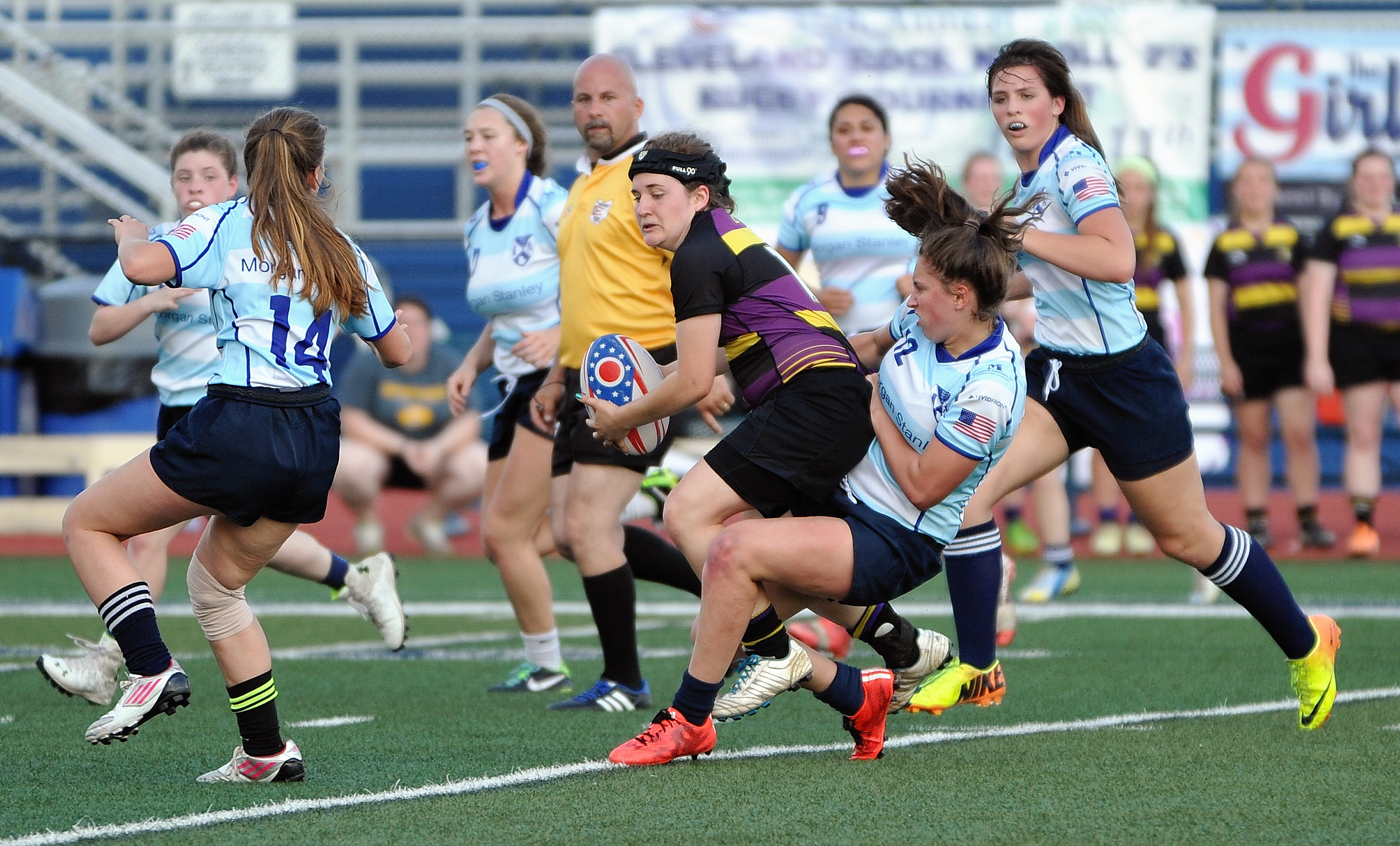 several women are playing a game of football