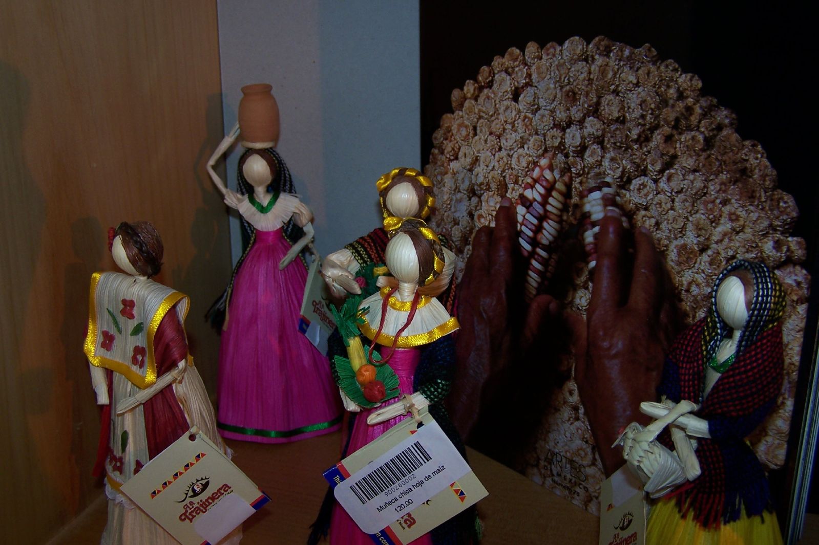 a group of ceramic figures are displayed