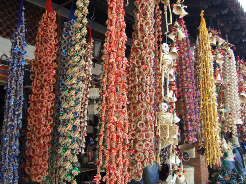 there is an assortment of christmas baubles on display