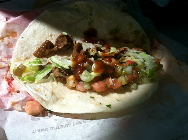 an image of a meat taco on a wrap