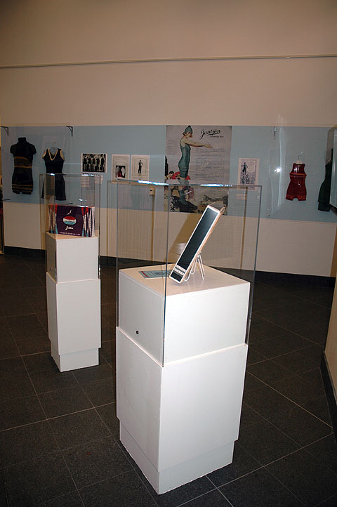 an electronics store with modern technology in display cases