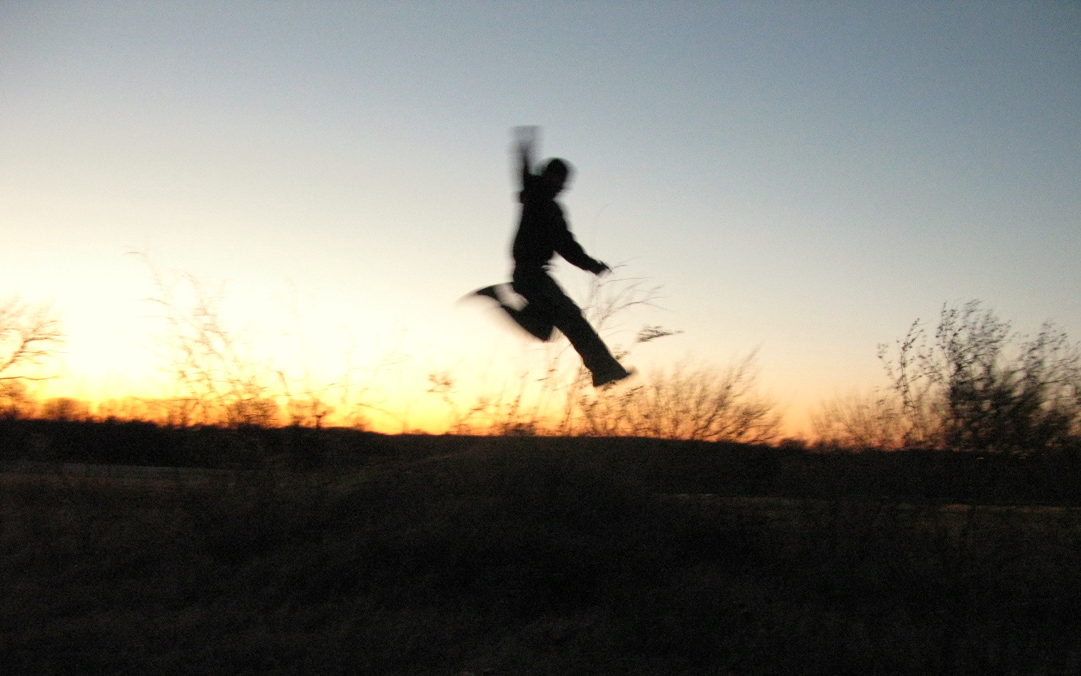 a man who is jumping up in the air