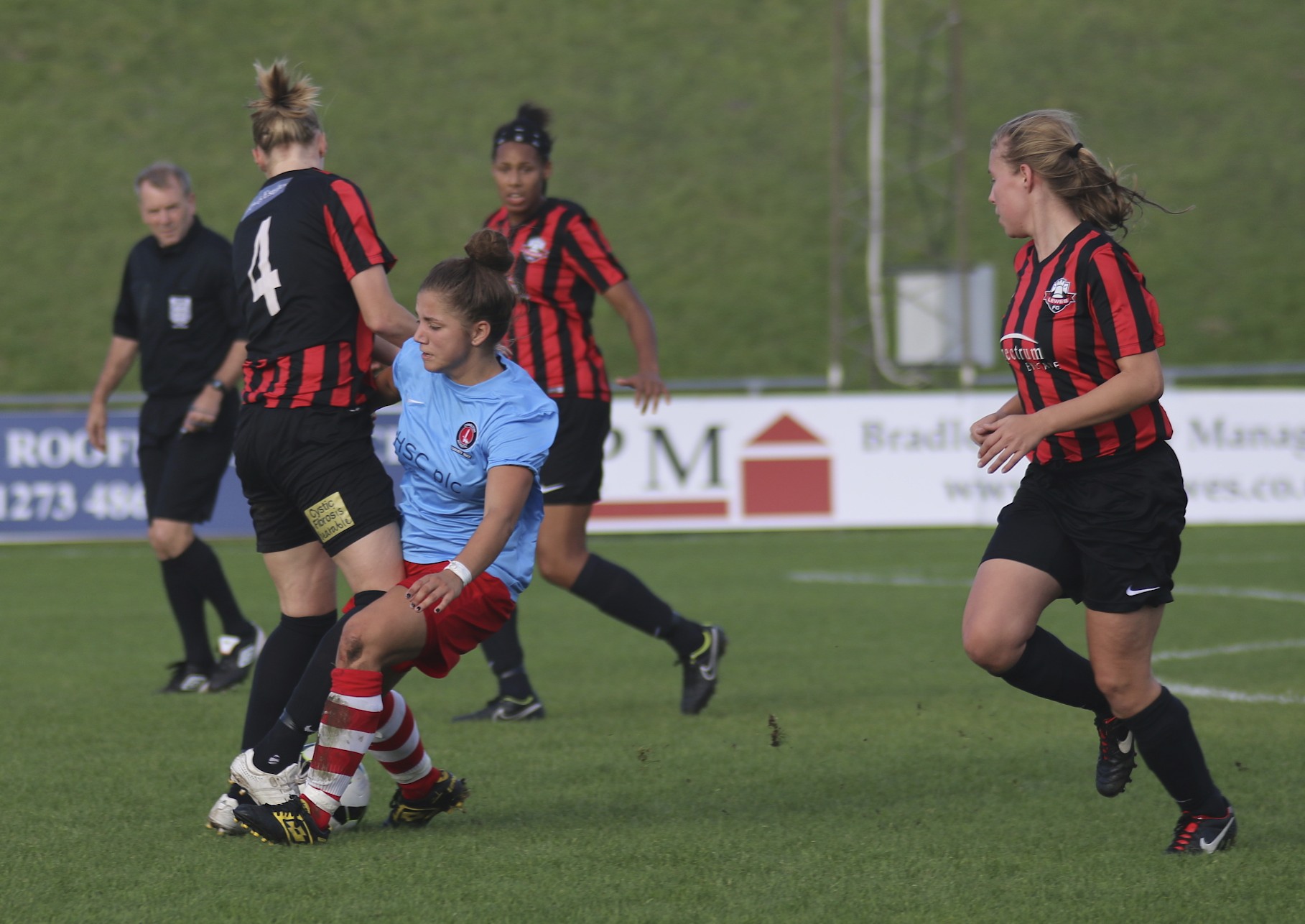 some girls in action on the soccer field