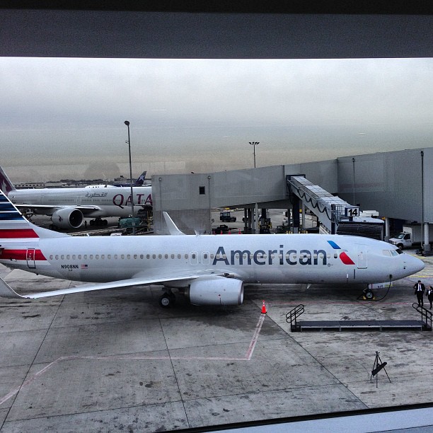 american airlines commercial aircraft parked on an airport tarmac