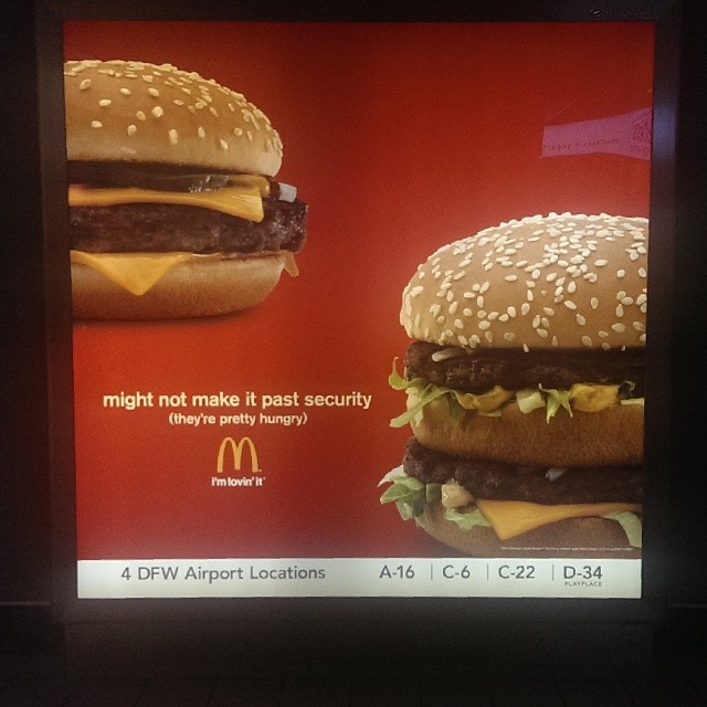 an advertit advertises big mac sandwiches on display