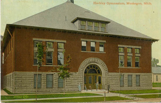 a vintage postcard shows the front of an old building