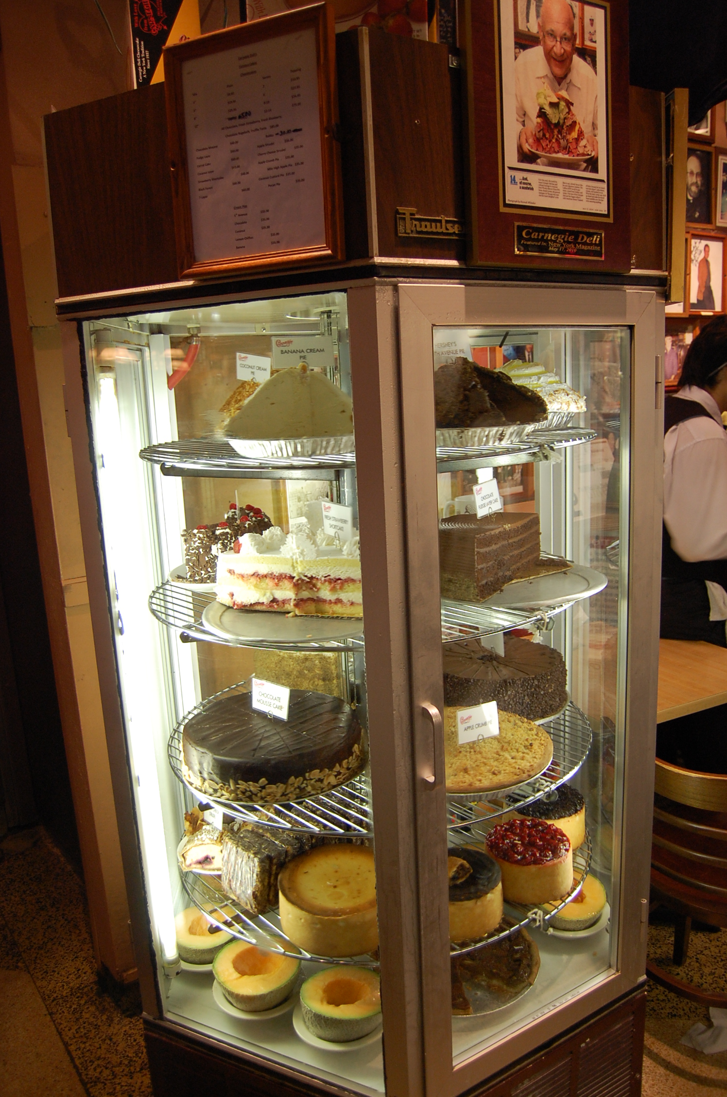 a dessert display in front of a restaurant