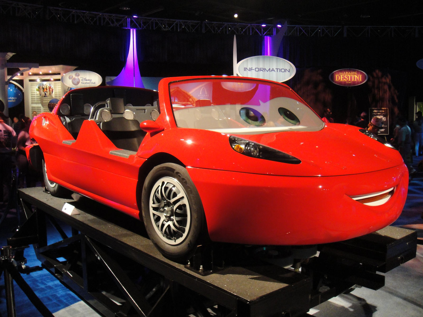 a car is on display in a museum