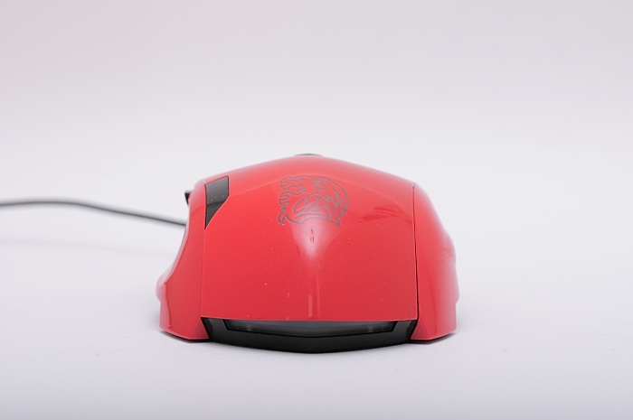 a computer mouse with a tiger emblem on it