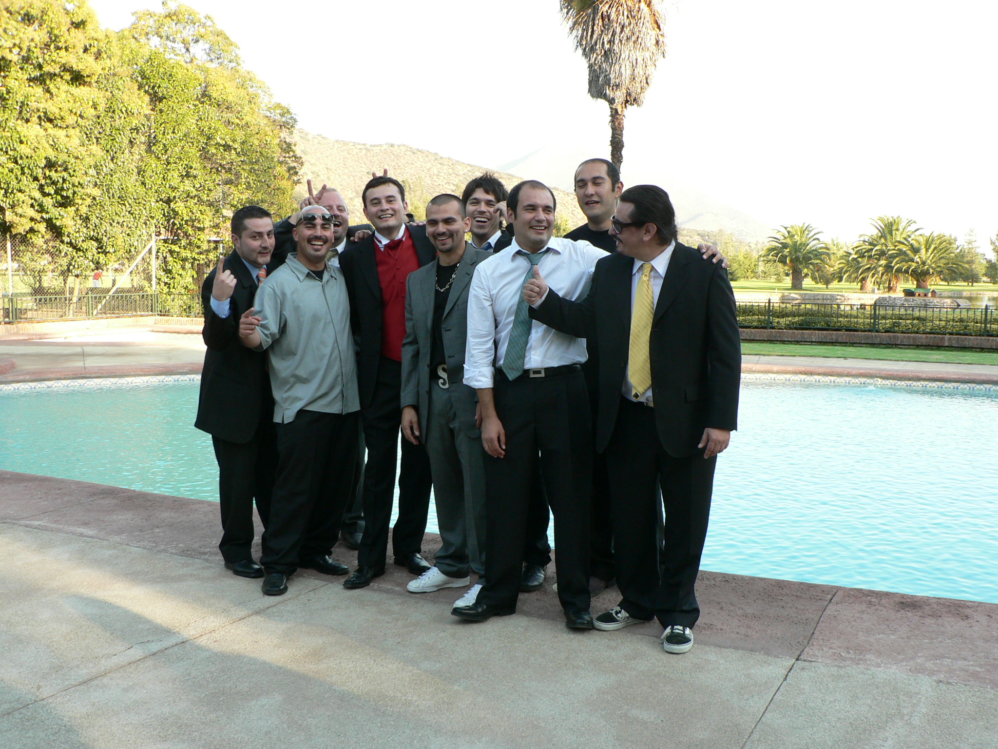 an outdoor group po near the pool for a party